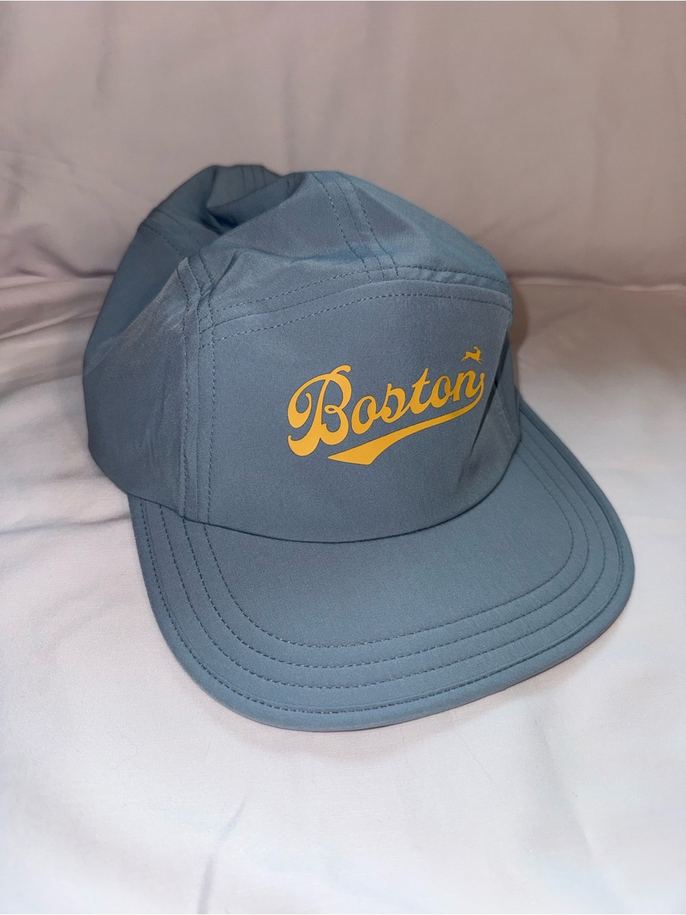 The Tracksmith Hare Top it Off Cap 2026 Boston Marathon